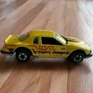 Vintage 1981 Hot Wheels Ford Thunderbird #4 Racing Yellow Malaysia Die-Cast Car